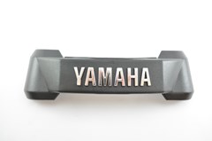 EMBLEMA FRONTAL YBR 125 DEMTEC